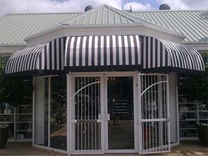 Striped rigid round awnings